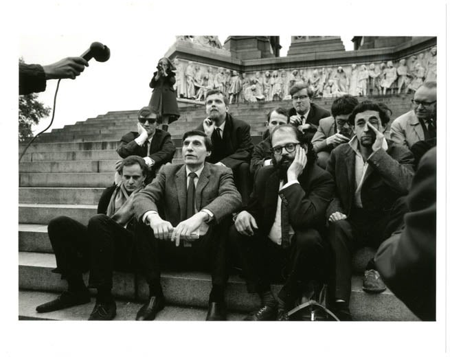 Item #39350 An original glossy b/w photograph by John Hopkins of the Albert Hall Poetry Reading's main participants assembled for a press conference on the steps of the Albert Memorial, June 10, 1965. INTERNATIONAL POETRY INCARNATION.