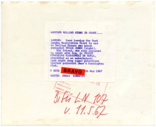 Two original 8x10 press photographs together with two exceedingly rare stickers relating to Brian Jones's arrest for drug possession in May 1967.