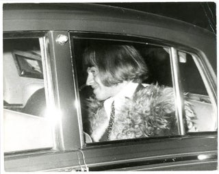 Two original 8x10 press photographs together with two exceedingly rare stickers relating to Brian Jones's arrest for drug possession in May 1967.