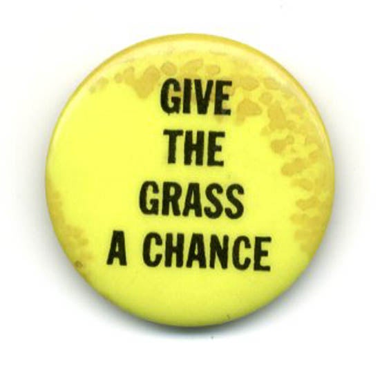 Item #39632 Original ‘60s pin badge printing the slogan “Give The Grass A Chance”. MARIJUANA BADGE.