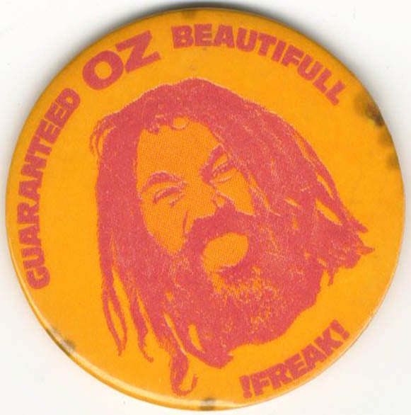 Item #40373 A ‘Guaranteed Oz Beautiful !Freak!’ badge, in orange and red (positive photo image). OZ BADGE.