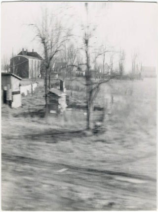 A collection of 23 b/w photographs by William Burroughs, taken during his “St. Louis Return” assignment for Playboy magazine in December 1964.