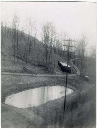 A collection of 23 b/w photographs by William Burroughs, taken during his “St. Louis Return” assignment for Playboy magazine in December 1964.