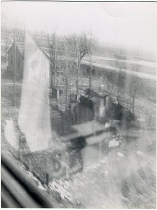 A collection of 23 b/w photographs by William Burroughs, taken during his “St. Louis Return” assignment for Playboy magazine in December 1964.