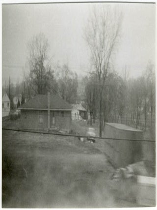 A collection of 23 b/w photographs by William Burroughs, taken during his “St. Louis Return” assignment for Playboy magazine in December 1964.