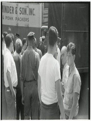 Twenty-two 35mm b/w negatives on six strips featuring photographs by William Burroughs taken nearby his apartment at 210 Centre Street, New York, c. summer 1965.