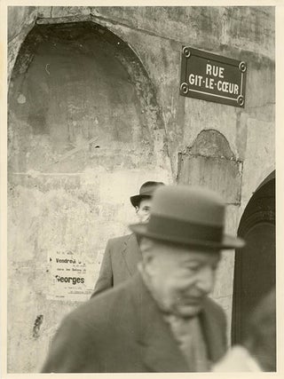 A collection of 13 b/w photographs of William Burroughs on the Left Bank in Paris, taken by Brion Gysin as publicity for “The Naked Lunch on four separate occasions c. September/October 1959”.