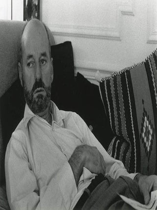 A group of three b/w photographs of Lawrence Ferlinghetti reclining on a couch, Paris, June 1965 (precise date and location unknown).