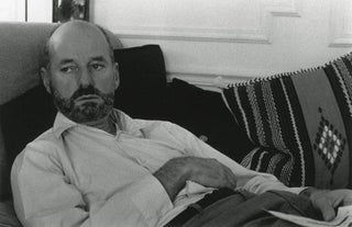 A group of three b/w photographs of Lawrence Ferlinghetti reclining on a couch, Paris, June 1965 (precise date and location unknown).