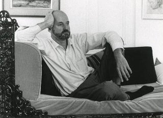 A group of three b/w photographs of Lawrence Ferlinghetti reclining on a couch, Paris, June 1965 (precise date and location unknown).
