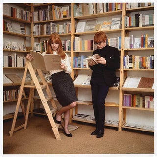 Item #41240 A colour photograph of Jane and Peter Asher posing by the newly constructed...