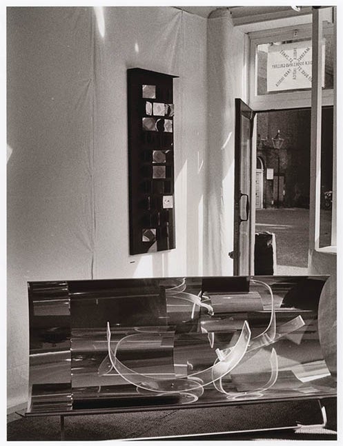 Item #41264 A b/w photograph by Keith Avison of the entrance to Indica, viewed from the ground floor interior, c. June 1966. INDICA BOOKS, GALLERY.