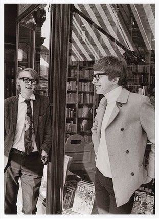 Item #41273 A b/w 16 Magazine publicity photograph of Barry Miles and Peter Asher standing...