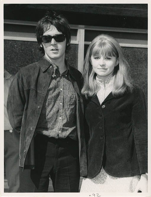 An original b/w press photograph of Paul McCartney and Jane Asher at London Heathrow, following. Paul McCARTNEY, Jane ASHER.